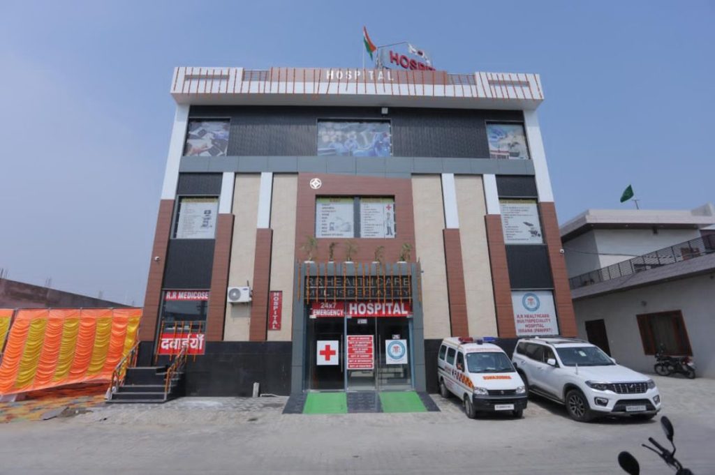 R.R. Healthcare Multispeciality Hospital building in Israna, Panipat, with the 24x7 emergency entrance and ambulance